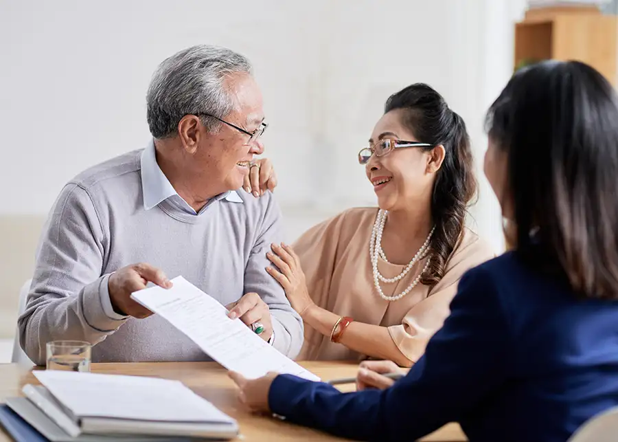 Elderly Asian couple finalizing their will together - Springfield, IL