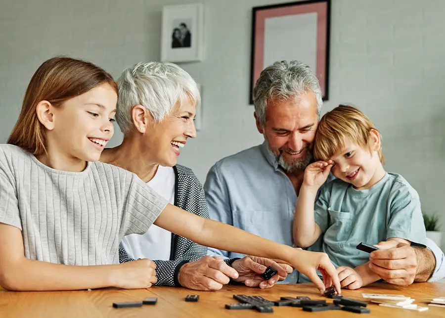 Guardianship - Grandparents playing dominos with minor grandchild after gaining guardianship - Springfield, IL